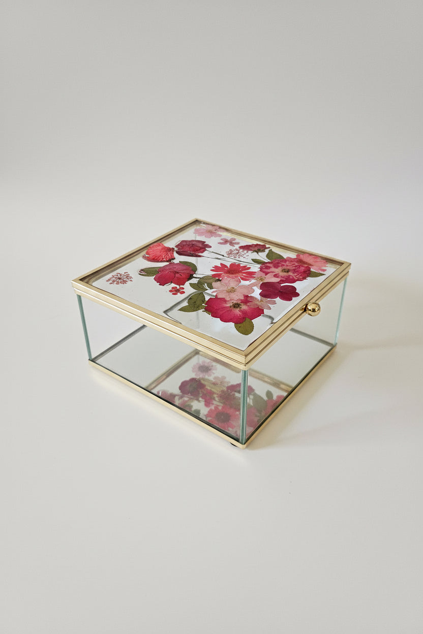 Floral mirrored keepsake and jewelry box with real pressed flowers. A 5" botanical glass box by artist Angel Singh, blending elegant storage with preserved floral art.
