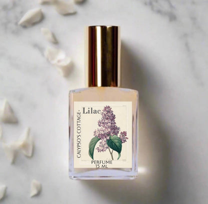 Romantic Lilac Perfume Oil with notes of neroli, lilac, gardenia, and musk. A clean, vegan fragrance handcrafted with organic jojoba and almond oils.