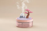 Cherry tree plant humidifier with cool mist and 7-color night light. Quiet 320ml desktop humidifier for houseplants, bedrooms, and desks.
