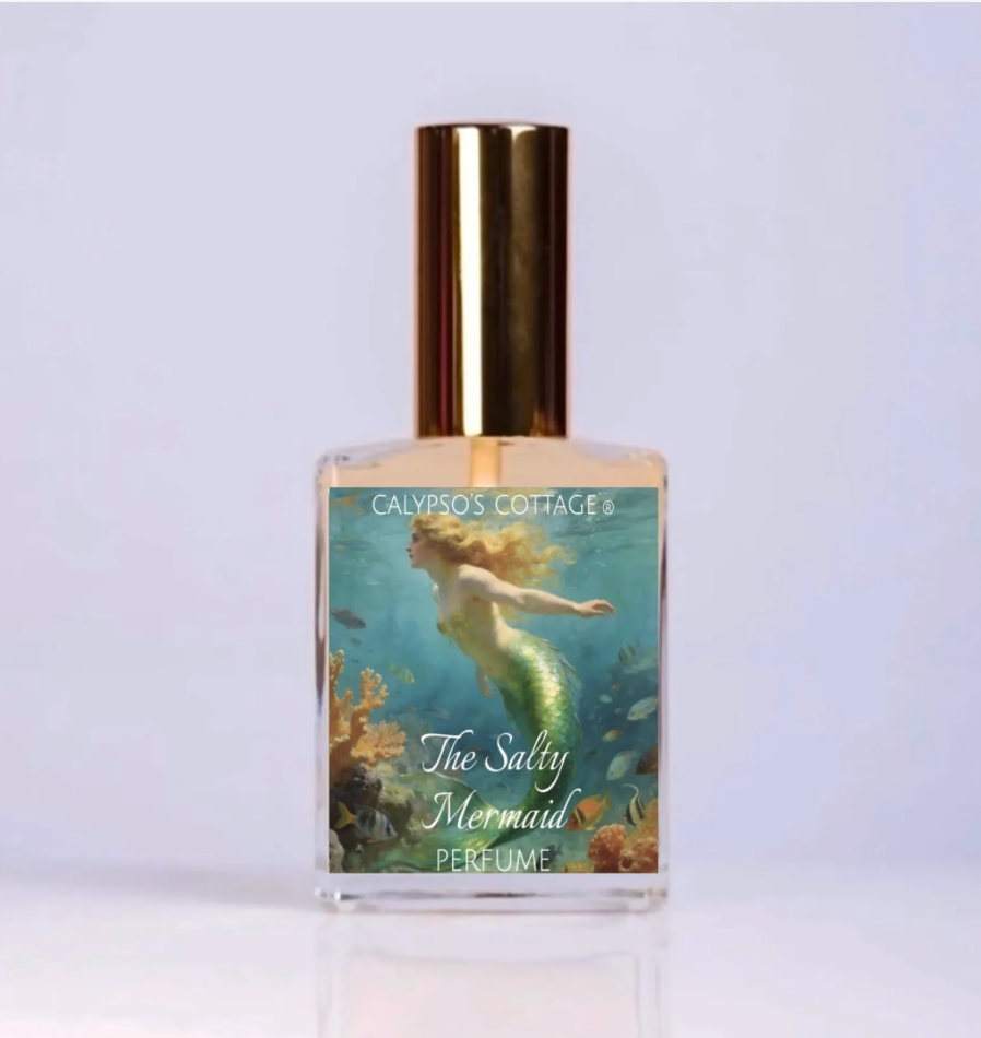 The Salty Mermaid Perfume Oil blends sea salt, ozone, sage, and driftwood for a fresh, coastal fragrance inspired by salty air and moonlit oceans.