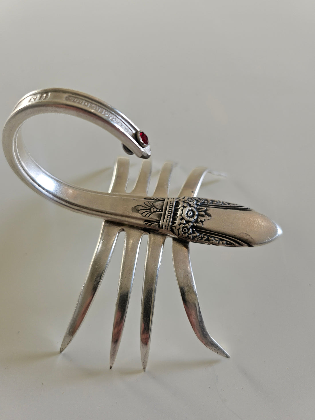 Handcrafted from vintage silverware, these salvaged scorpion and turtle sculptures bring charm, symbolism, and eco-friendly artistry to any space