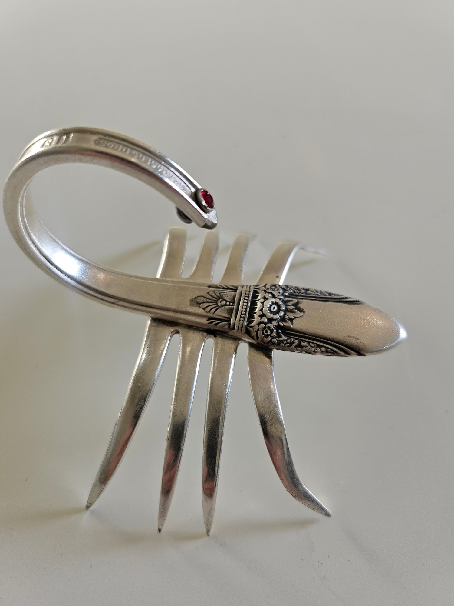 Handcrafted from vintage silverware, these salvaged scorpion and turtle sculptures bring charm, symbolism, and eco-friendly artistry to any space