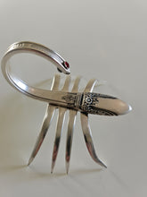 Handcrafted from vintage silverware, these salvaged scorpion and turtle sculptures bring charm, symbolism, and eco-friendly artistry to any space