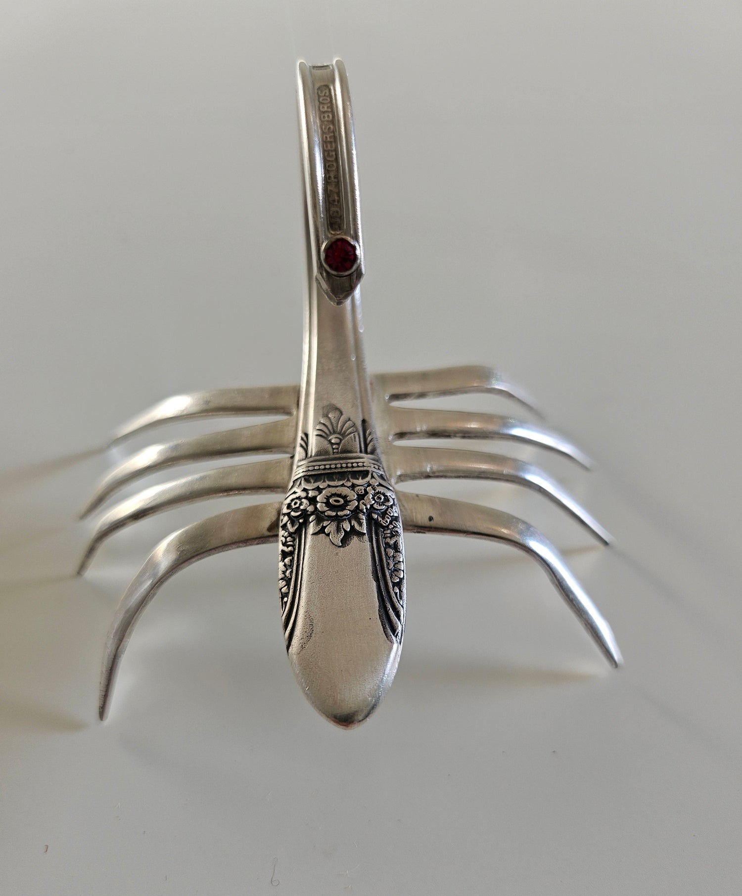 Handcrafted from vintage silverware, these salvaged scorpion and turtle sculptures bring charm, symbolism, and eco-friendly artistry to any space