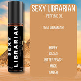 Sexy Librarian Perfume—honey, bitter peach, rose, cacao, musk & amber. A sensual, bookish roll-on scent for clever, captivating, irresistibly smart women.
