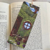 Hand-illustrated "Breakfast at the Shire" bookmark on premium textured paper. A cozy, literary-inspired keepsake for book lovers and fantasy fans alike!