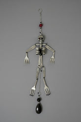 Skeleton Rattle & Bone Hanging Chime handcrafted from vintage silverware with crystal accent—whimsical skeleton wind chime with soft sound and one-of-a-kind charm.