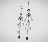 Skeleton Rattle & Bone Hanging Chime handcrafted from vintage silverware with crystal accent—whimsical skeleton wind chime with soft sound and one-of-a-kind charm.