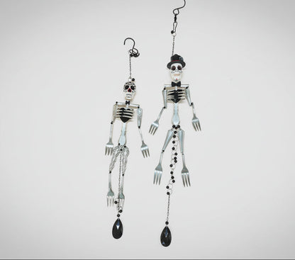 Skeleton Rattle &amp; Bone Hanging Chime handcrafted from vintage silverware with crystal accent—whimsical skeleton wind chime with soft sound and one-of-a-kind charm.