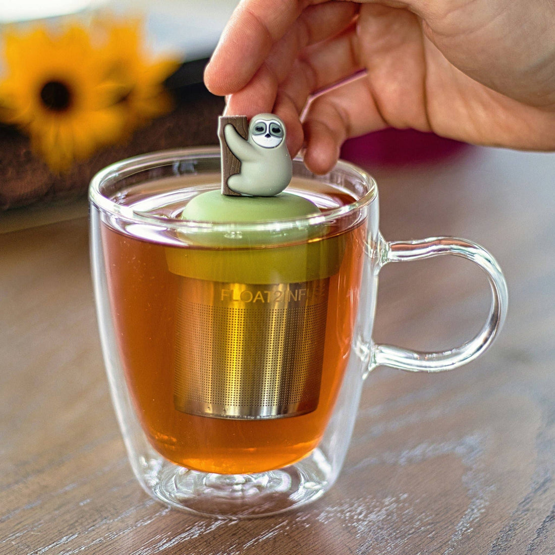 Cute Sloth Tea Steeper with silicone cap and fine mesh. Perfect for hot or iced tea, reusable, giftable, and designed with heart.
