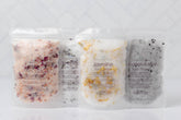 Handcrafted 5 oz botanical bath salts in heat-sealed pouches. Plant-based, aromatic blends with essential oils & florals for a calming, skin-softening soak.