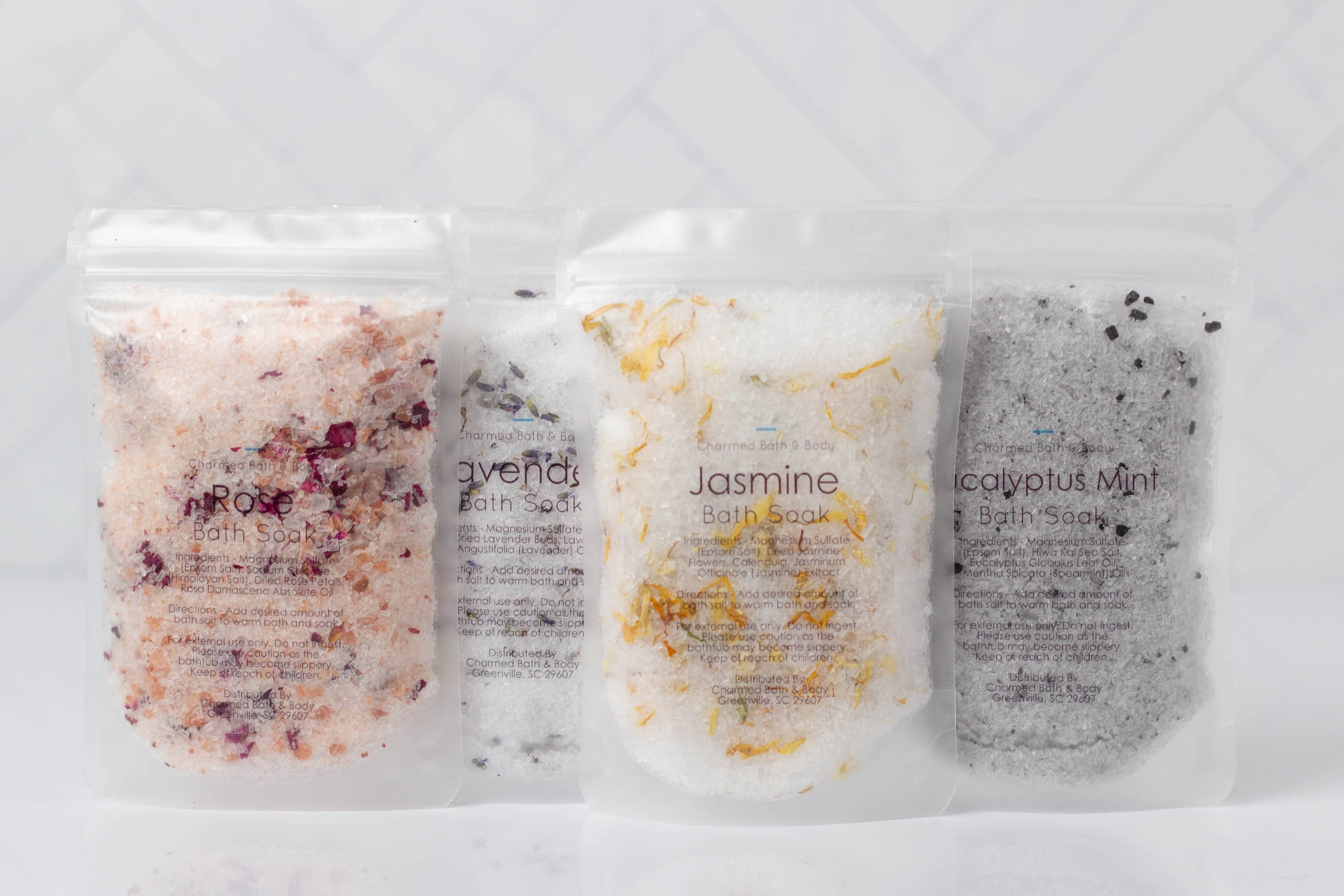 Handcrafted 5 oz botanical bath salts in heat-sealed pouches. Plant-based, aromatic blends with essential oils &amp; florals for a calming, skin-softening soak.