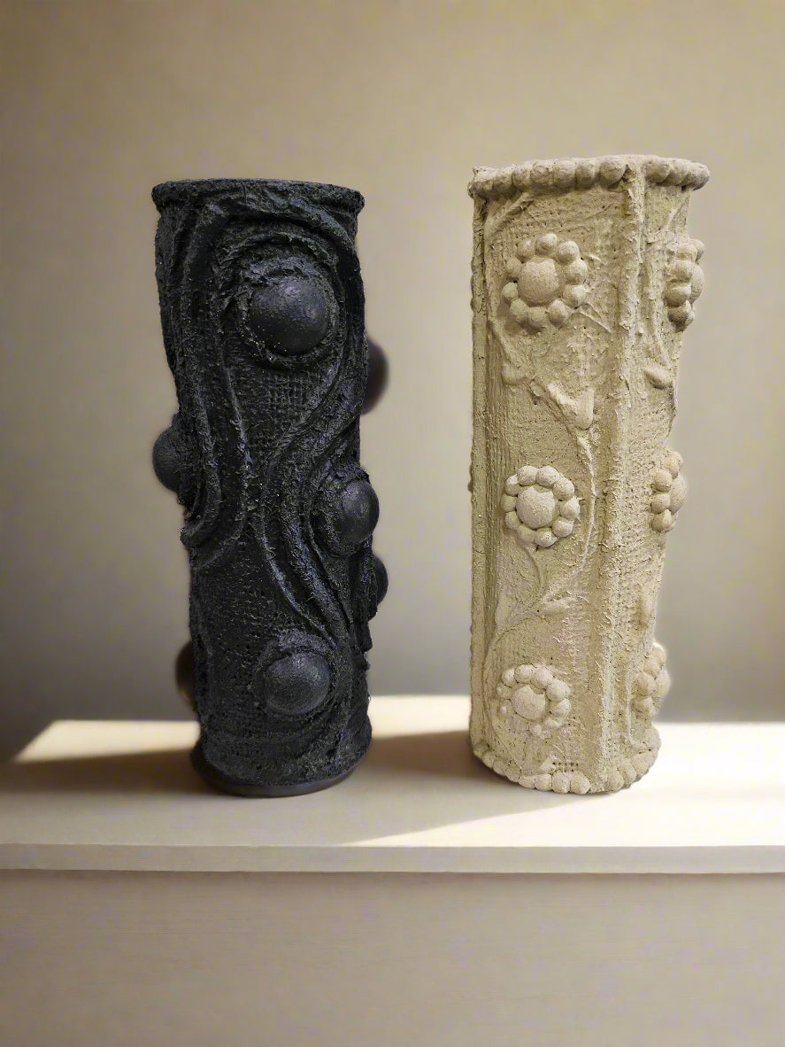 Elevate your space with this handcrafted upcycled glass Relics Small Cylinder Vase. Made from reclaimed materials, each piece is unique, eco-friendly, and artfully designed. Choose from Matte Grey, Matte Sand finishes. Watertight and perfect for fresh or dried blooms.