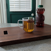 Green Heart Book Tea Steeper makes loose leaf tea easy in any mug. Reusable, dishwasher safe, eco-friendly. A charming gift for tea and book lovers.