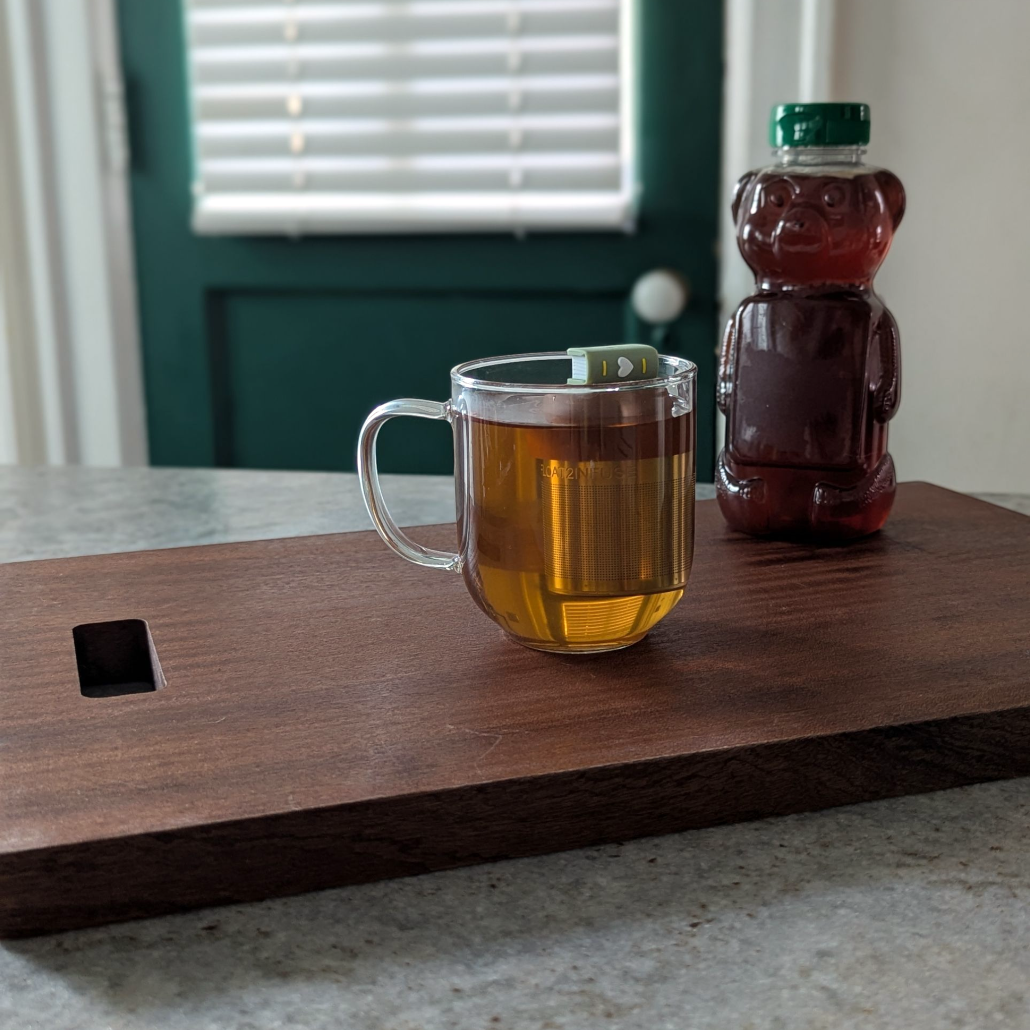 Green Heart Book Tea Steeper makes loose leaf tea easy in any mug. Reusable, dishwasher safe, eco-friendly. A charming gift for tea and book lovers.