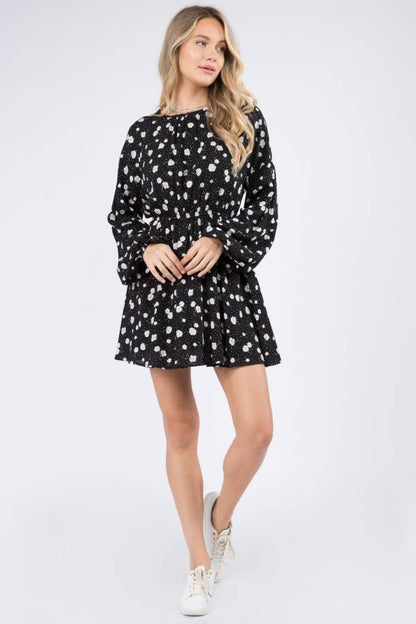 Starry Blossom Woven Dress with long sleeves, elastic waist &amp; floral print. A chic black mini perfect for day-to-night style. Lined &amp; lightweight.