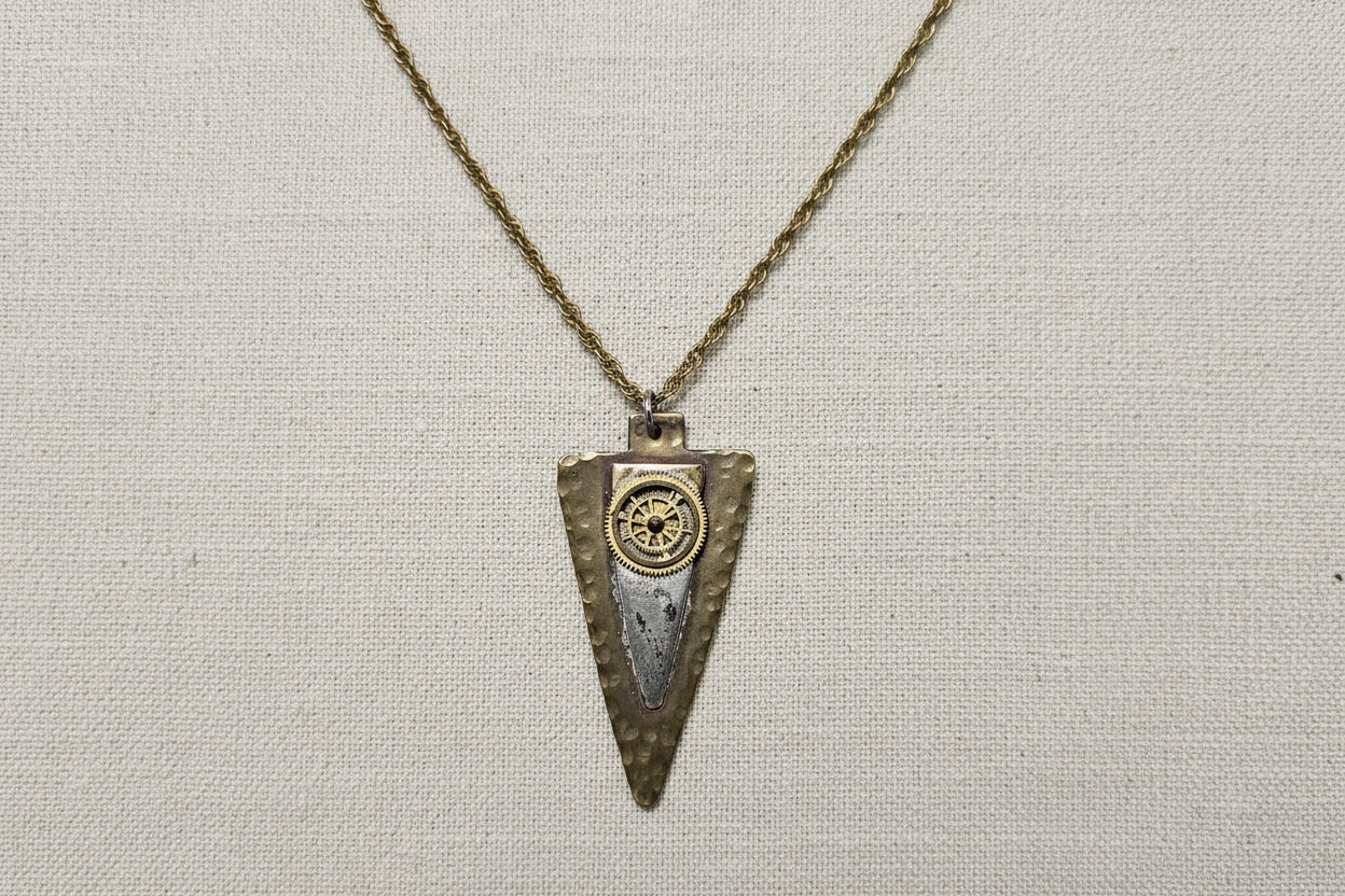 Steampunk pendants with gears, chains, tags, beads, and airship-inspired designs. Handcrafted, unique mixed-media necklaces perfect for cosplay, gifting, and fans of steampunk