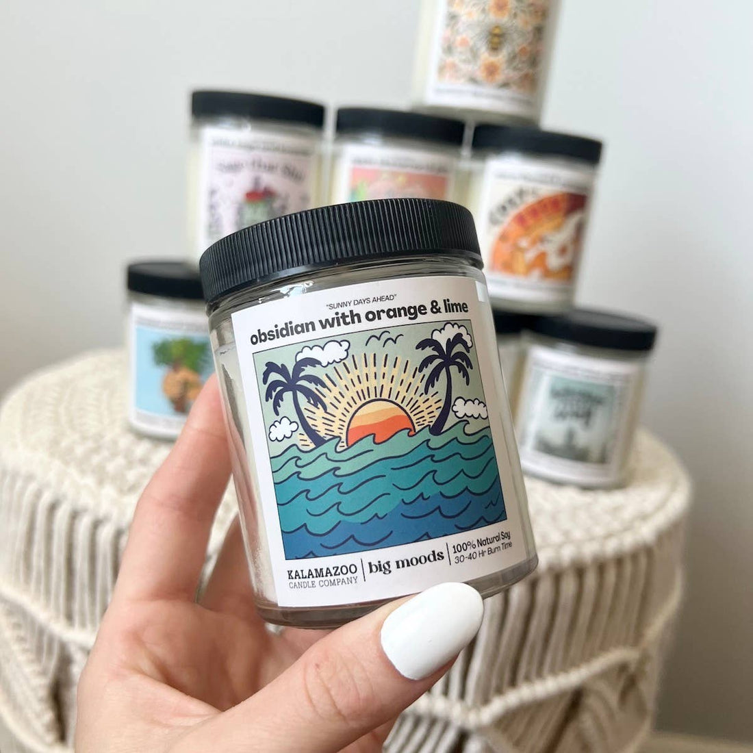 Sunny Days Ahead: A bright blend of orange, lime & obsidian in a 5oz soy candle. Vegan, eco-friendly, and hand-poured for 30–40 hours of sunny coastal bliss.