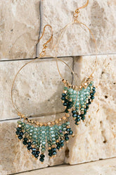Shimmering beaded tassel chandelier earrings with a lightweight metal ring, hypoallergenic fish hooks, and dazzling glass beads—perfect for any occasion! 