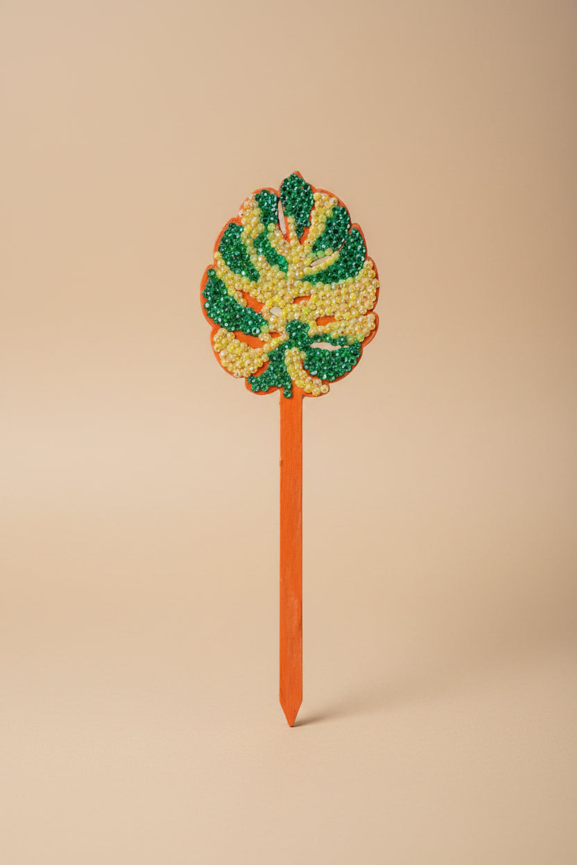 Bedazzled Monstera wooden plant stakes, hand-painted with sparkling details. Choose Monstera, Albo, Aurea or Thai Constellation for unique plant décor.