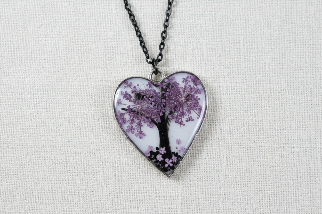 Tree of Life Purple resin heart necklace on chain, handcrafted and one-of-a-kind. A symbolic, nature-inspired piece representing growth, balance, and connection.