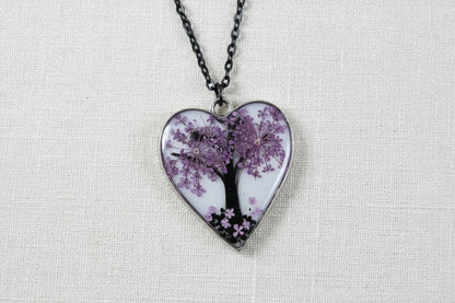 Tree of Life Purple resin heart necklace on chain, handcrafted and one-of-a-kind. A symbolic, nature-inspired piece representing growth, balance, and connection.