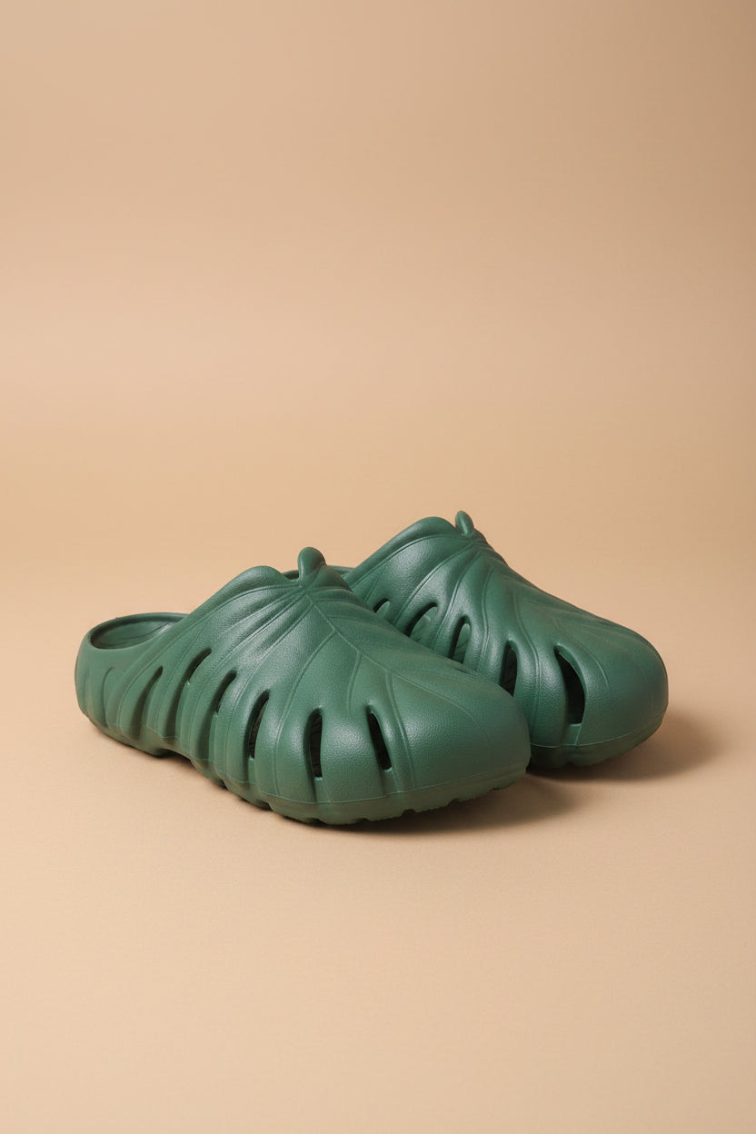 Unsent Studios Monstera Mule in Size 7. Designer botanical footwear featuring cloud-soft comfort, sculptural style, and Monstera-inspired design.