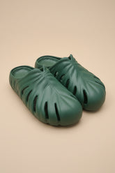 Unsent Studios Monstera Mule in Size 7. Designer botanical footwear featuring cloud-soft comfort, sculptural style, and Monstera-inspired design.