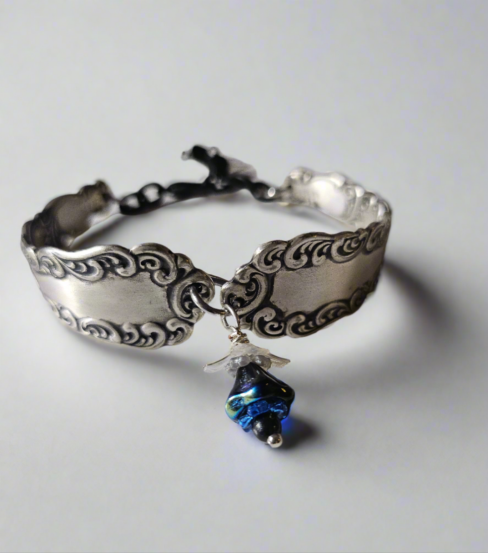 The American Beauty Vintage Bracelet is a handcrafted treasure made from authentic 1900-1940s American Beauty 