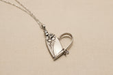 Handcrafted heart pendant made from vintage silverware. A unique, eco-friendly symbol of love—artisan-made in the USA and perfect for gifting or everyday wear.
