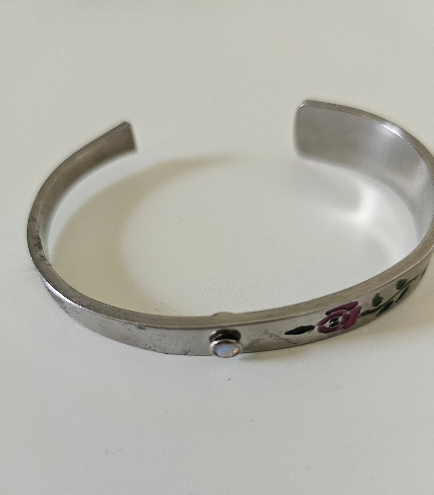 Handcrafted 6&quot; floral cuff bracelet made from vintage silverware with a jewel accent. A one-of-a-kind piece blending antique charm and timeless elegance.