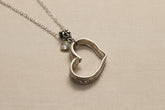 Handcrafted heart pendant made from vintage silverware. A unique, eco-friendly symbol of love—artisan-made in the USA and perfect for gifting or everyday wear.