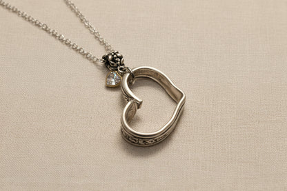 Handcrafted heart pendant made from vintage silverware. A unique, eco-friendly symbol of love—artisan-made in the USA and perfect for gifting or everyday wear.