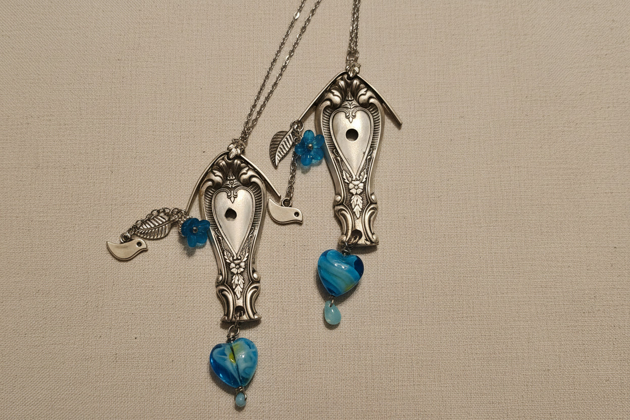 Vintage Sweetheart collectible silverware pattern transformed into a handcrafted birdhouse necklace. Sustainable cottagecore heirloom jewelry.