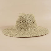 Open weave wide brim straw hat featuring breathable lattice texture and lightweight paper straw design. Perfect for beach days, festivals, vacations, and summer styling.