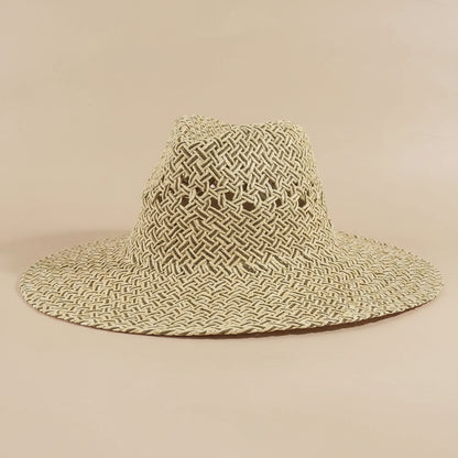 Open weave wide brim straw hat featuring breathable lattice texture and lightweight paper straw design. Perfect for beach days, festivals, vacations, and summer styling.