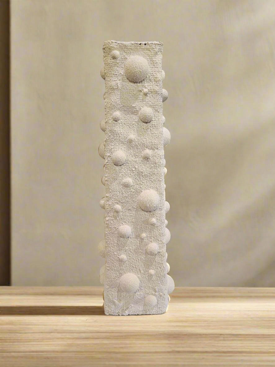 Elevate your space with this handcrafted upcycled glass Relics Cylinder Vase. Made from reclaimed materials, each piece is unique, eco-friendly, and artfully designed. Choose from Matte White, Glossy Black, or Sand finishes. Watertight and perfect for fresh or dried blooms. 