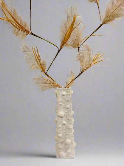 Elevate your space with this handcrafted upcycled glass Relics Cylinder Vase. Made from reclaimed materials, each piece is unique, eco-friendly, and artfully designed. Choose from Matte White, Glossy Black, or Sand finishes. Watertight and perfect for fresh or dried blooms. 