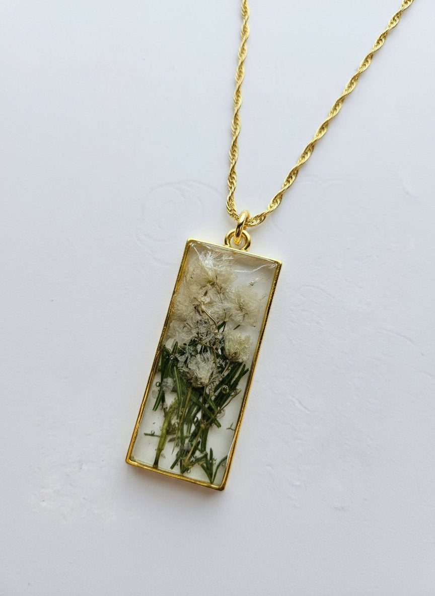Gathered-in-the-Wild Botanical Necklace with real foraged flowers, mushrooms, pine needles, and leaves preserved in resin. Handcrafted wearable nature art by KStonely.
