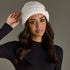 White chunky knit cuffed beanie with cozy fleece lining. Made from 100% acrylic, this classic winter hat adds warmth and timeless style to chilly days.