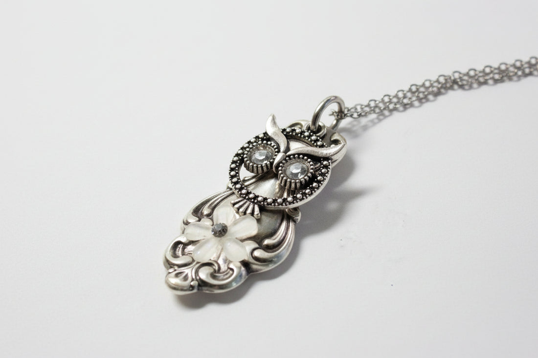 Handcrafted owl necklace made from vintage silverware. 1" pendant on 18" chain. Unique, upcycled jewelry with charm, symbolism, and timeless style.