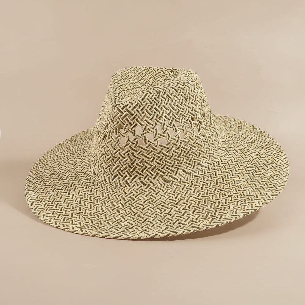 Open weave wide brim straw hat featuring breathable lattice texture and lightweight paper straw design. Perfect for beach days, festivals, vacations, and summer styling.