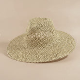 Open weave wide brim straw hat featuring breathable lattice texture and lightweight paper straw design. Perfect for beach days, festivals, vacations, and summer styling.