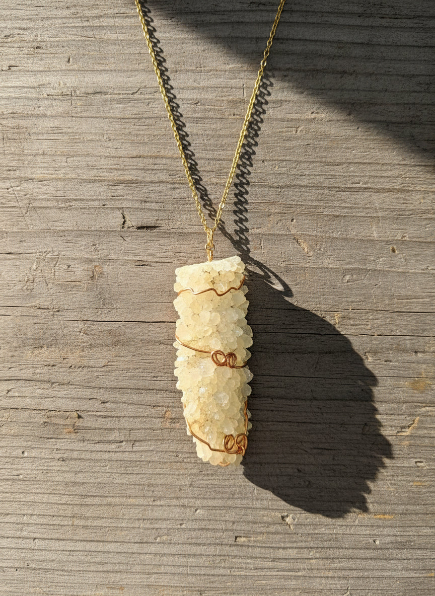 Handmade copper wire-wrapped crystal necklace by Kstonely. Features a 3&quot; x 1&quot; pendant on a gold chain—rustic, elegant, and perfect for boho jewelry lovers.