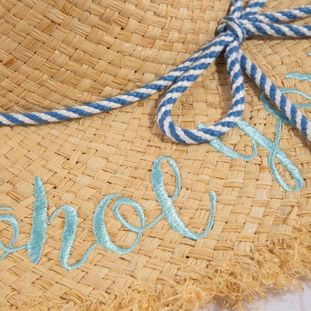 Woven raffia sun hat featuring lightweight breathable texture and timeless summer style. Perfect for beach days, vacations, casual outfits, and warm-weat
