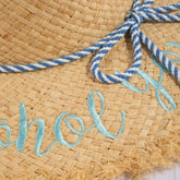 Woven raffia sun hat featuring lightweight breathable texture and timeless summer style. Perfect for beach days, vacations, casual outfits, and warm-weat
