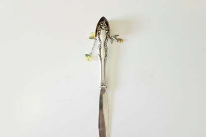 Handcrafted silverware birdhouse plant stake by KStonely. Upcycled, hand-painted, and beaded—whimsical cottagecore décor perfect for adding charm to any plant.
