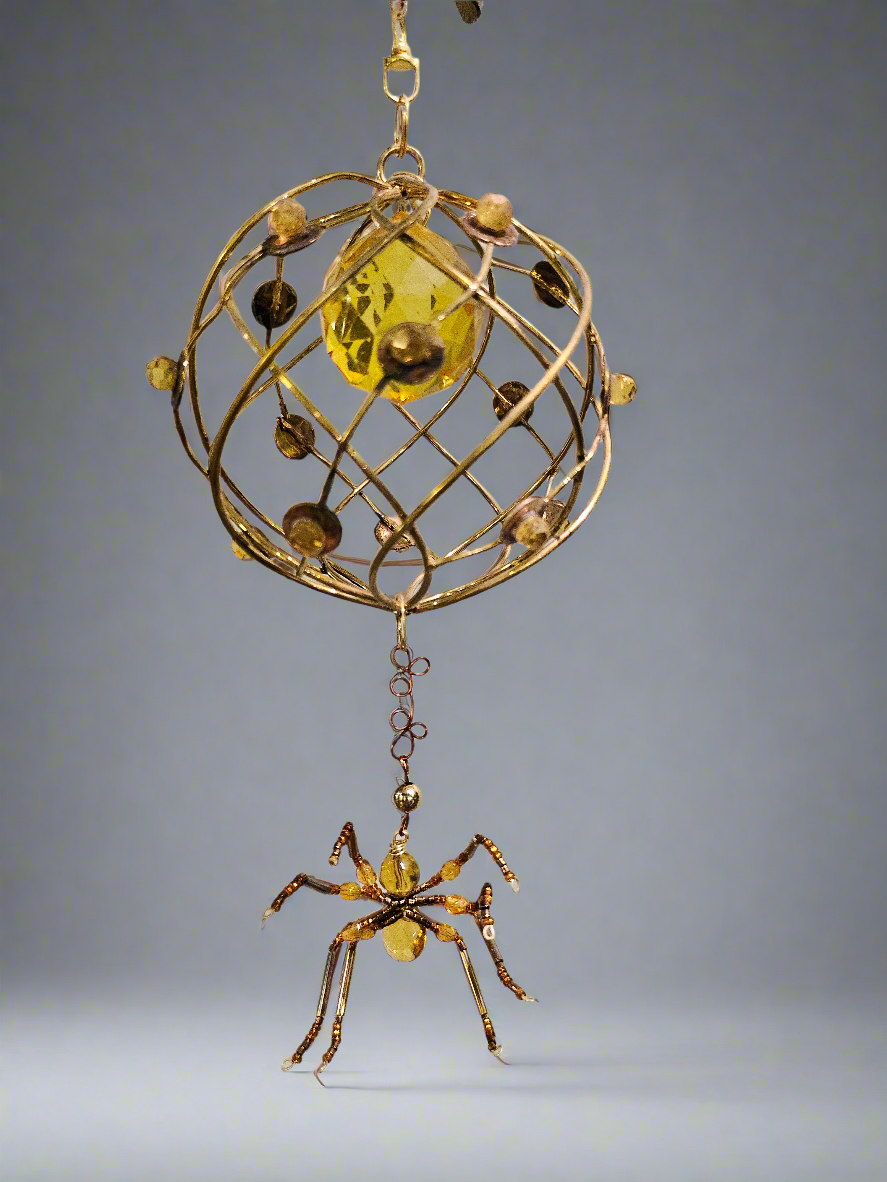 The Christmas Spider Ornament brings charm and tradition to your holiday decor. Inspired by the German legend of spiders weaving webs that Santa turned into shimmering tinsel, it symbolizes good luck and magic. Beautifully crafted, it’s a meaningful and unique addition to your tree or a thoughtful gift.