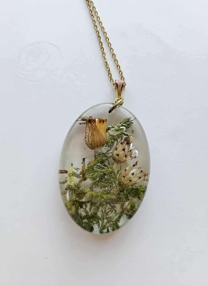Gathered-in-the-Wild Botanical Necklace with real foraged flowers, mushrooms, pine needles, and leaves preserved in resin. Handcrafted wearable nature art by KStonely.