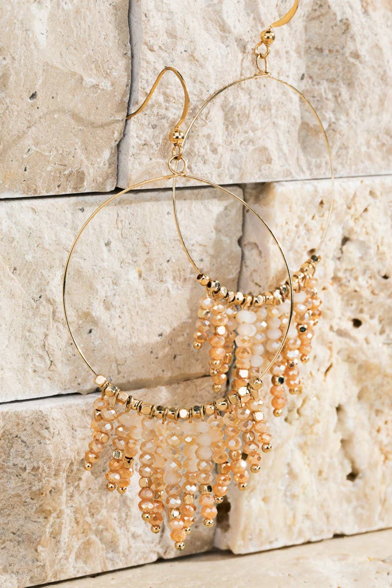 Shimmering beaded tassel chandelier earrings with a lightweight metal ring, hypoallergenic fish hooks, and dazzling glass beads—perfect for any occasion! 